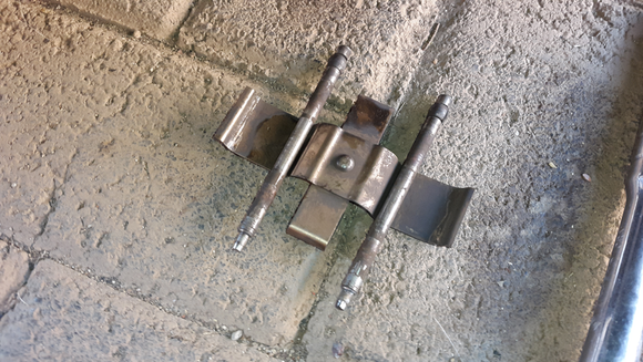 This is the mounting hardware for the brake pads at the rear. The plate is different in length and design for the front.