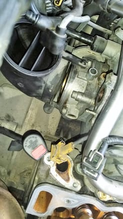 I unscrewed the tranny dipstick bolt and moved the dipstick to the side, disconnected the MAF and lower TB connector, and disconnected the the back injector clip.