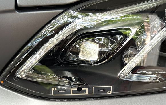 drivers side headlight cover