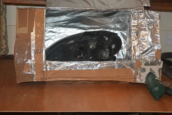 cut and taped together large carboard boxes, lined with tinfoil and a baffle inside