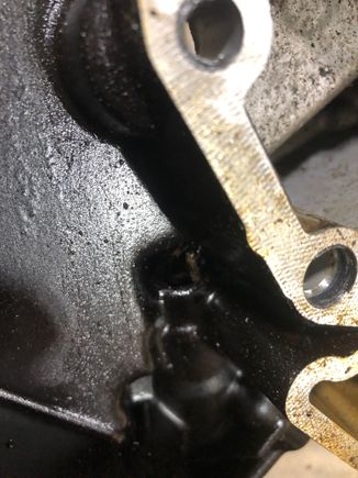 There’s the front cover and how it goes into the crankcase. It is about a 1/2” hole that pretty much takes a 90 degree turn inside the front cover. Don’t think a tube will fall all of the way through. 