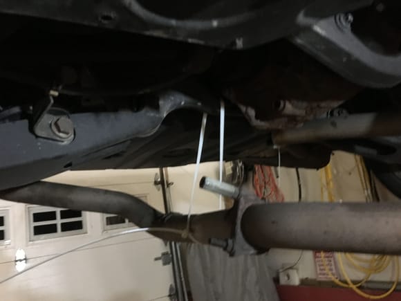 I slipped the exhaust through the loops and then I tightened them until the exhaust got into position (pics 5 and 6)