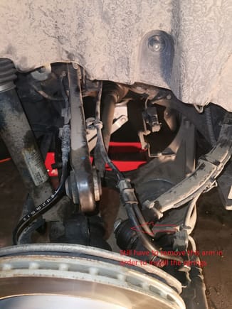 You only need to take the rear sway bar link and the rear strut to remove the broken springs, but to reinstall the springs, you have to take off the two upper control arms.
