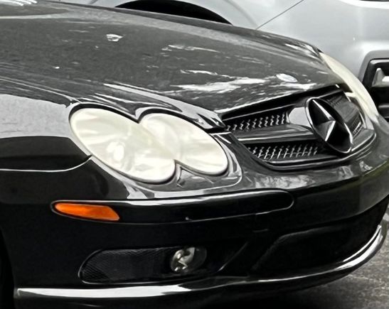 In 2020, original grille cracked in several places, replaced with this aftermarket black grille from eBay