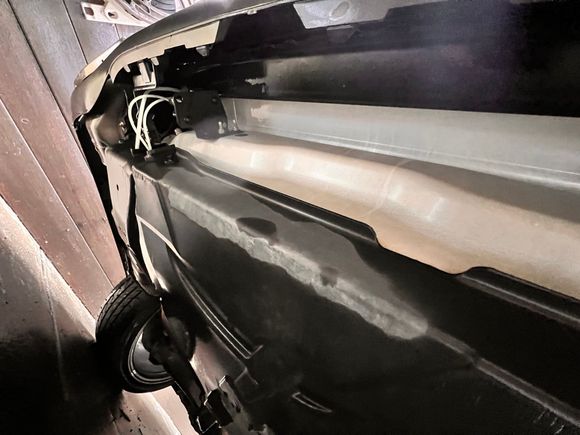 Under the rear bumper this whole area is exposed. Is there supposed to be a cover here? 