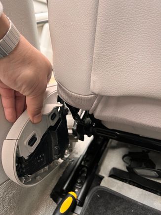 I slid it backwards toward the rear seats. 