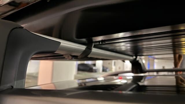 The new design utilized a twist-locking clamp instead of the older square screws that slide into the channel.