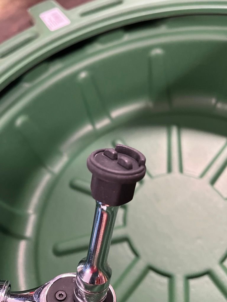 Adapter for removing/installing plastic drain plug.