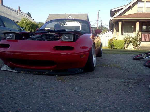 my friends sittin in the miata