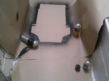 setting up the paint booth in the tiniest bathroom in the world. the rest of the seat would get dyed black later.