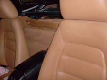 Adjustable headrest leather seats, unique to '95.