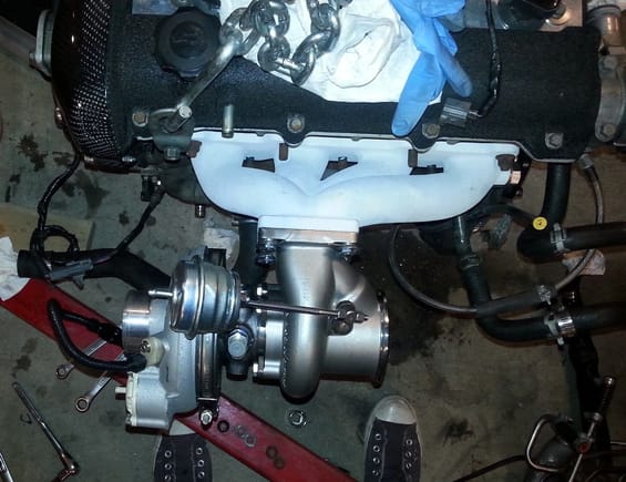 Turbo install trial fit, still need an exhaust manifold gasket. Check out the valve cover/turbo contrast!