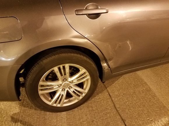 Someone reversed into my car while I was exiting parking lot.