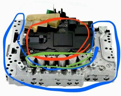 Red is the TCM. Green are the solenoids. Blue is the valve body itself.