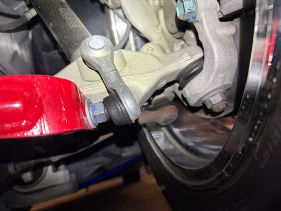 Driver’s side, view from in front of the wheel.