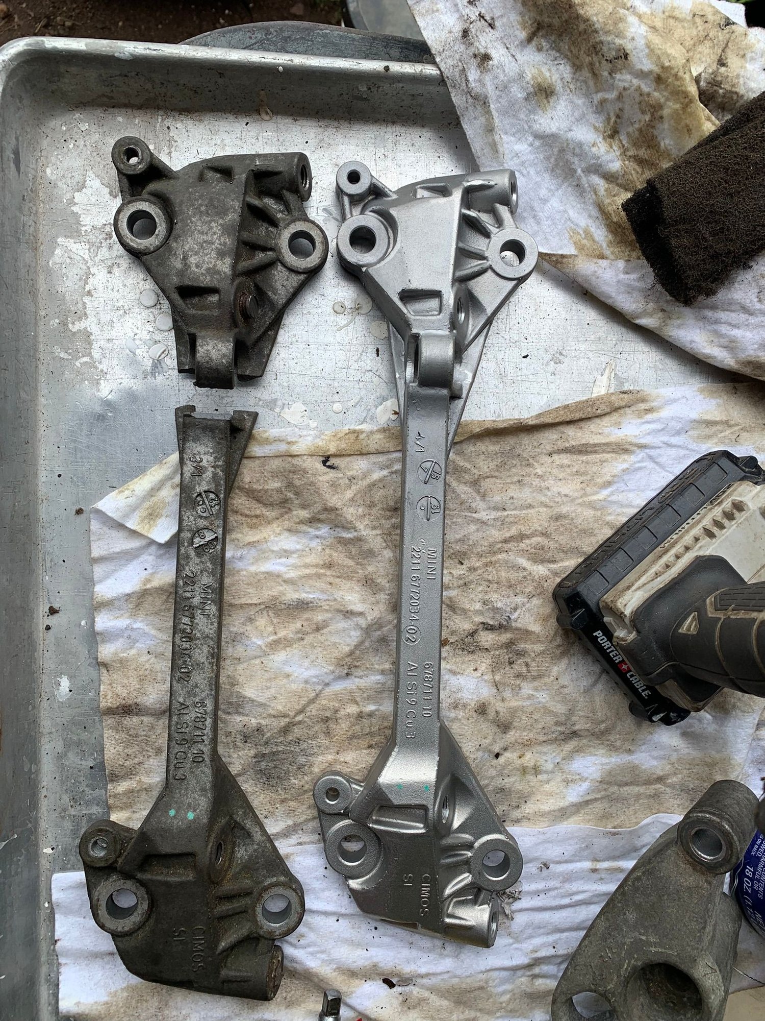 Broken right upper engine mount with replacement