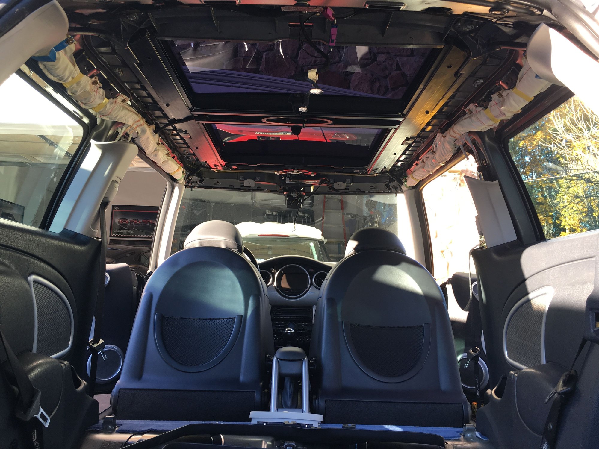 Replacing headliner in car with sunroof. North American Motoring