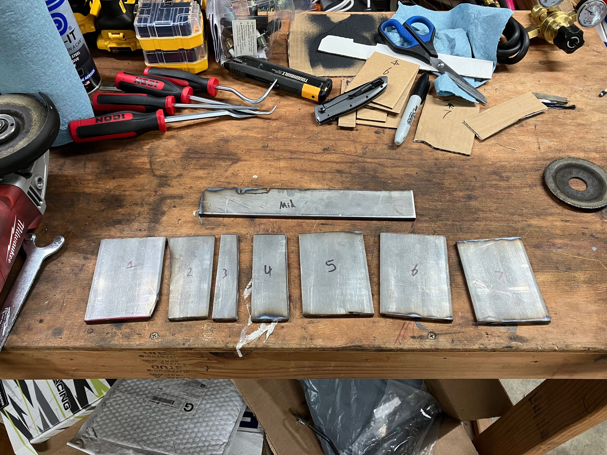 Remember kids, CAD stands for Cardboard Aided Design. I cut some shapes out of cardboard that fit the frame and then cut those same shapes out of 3/16 steel plate.