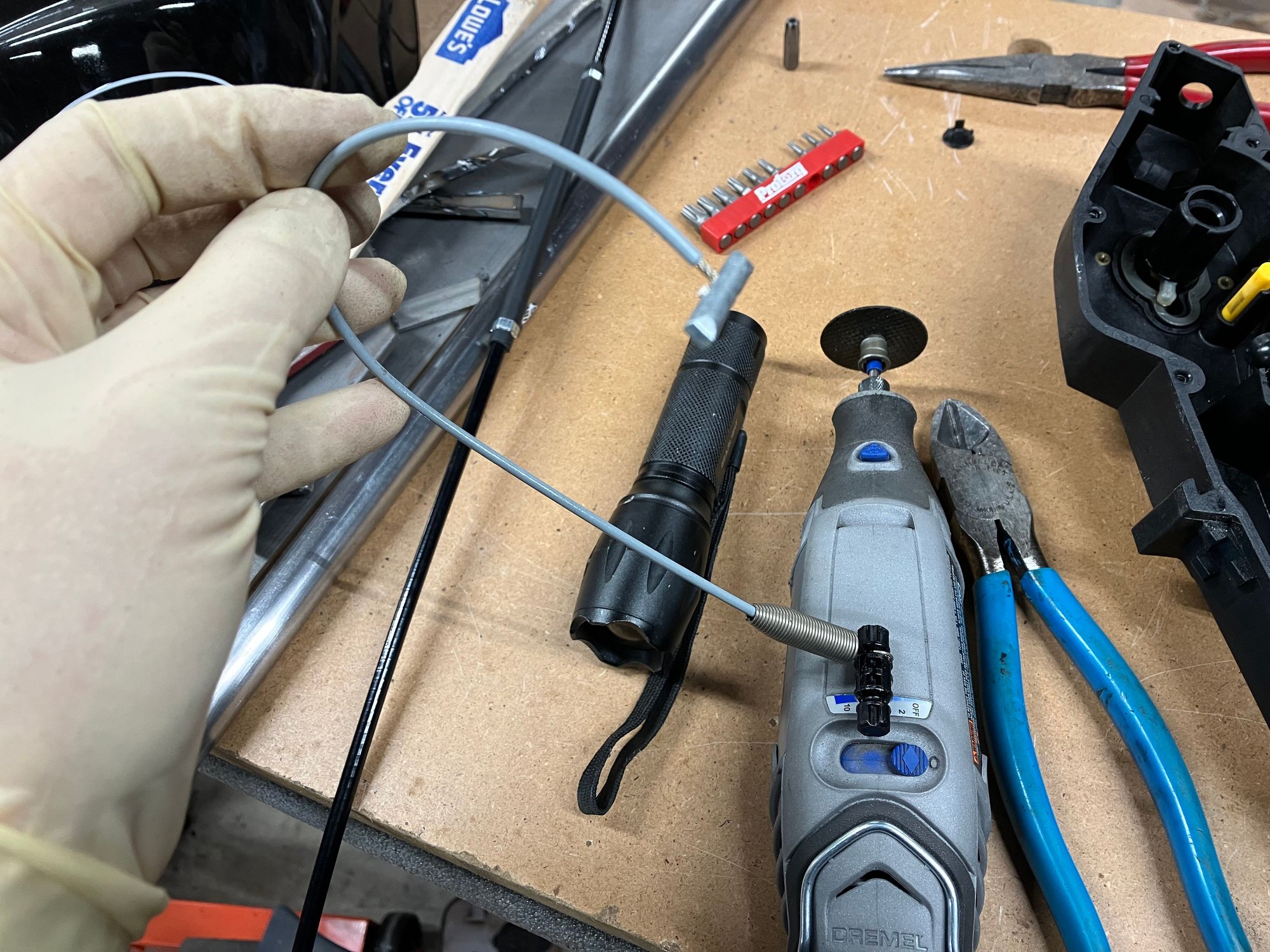 You�re going to want to pull the throttle wheel, take out the return springs and snip off the front most one or you could leave both springs if you want a heavier pedal feel.