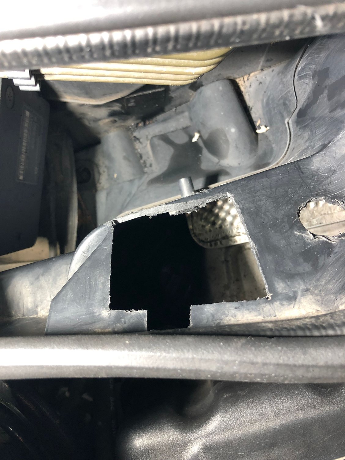 The notch is for the dip stick that I'll probably never use. 