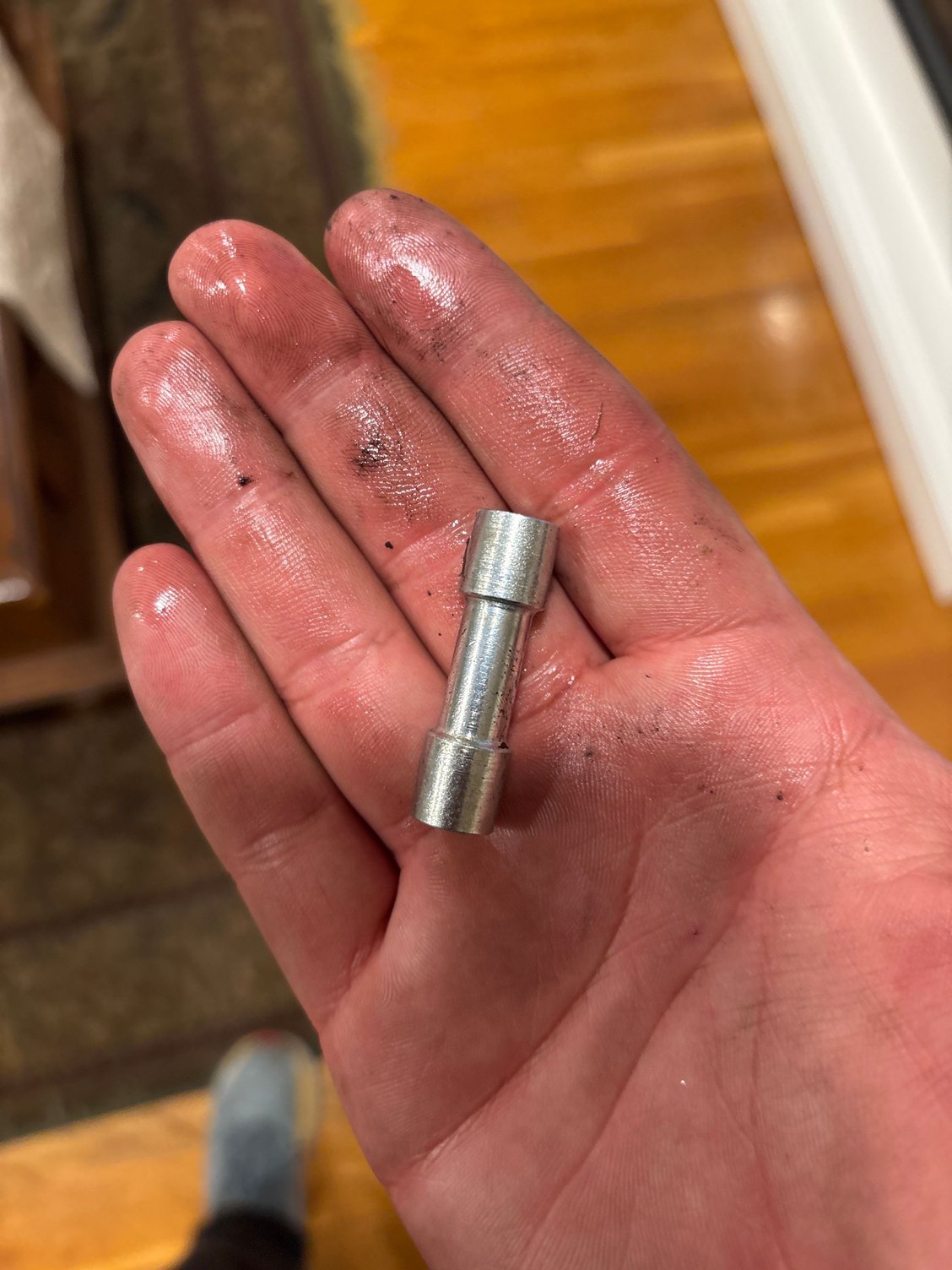 So this is a bit random. I remembered I did not have any hose clamps to put back the powersteering hose so I just ziptied it and completely forgot to install a clamp. Started moving the car and I heard a big pop and heard something fall down. All my powersteering fluid leaked down and I found this on the ground. Had a shop check it and they said it is not required to be in the hose. So far its driving fine but any of you guys have an idea of what I am supposed to do?