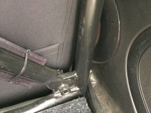 Diagonal bar lower mount on passenger side at the joint between the roll bar and lower cross bar