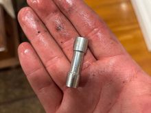 So this is a bit random. I remembered I did not have any hose clamps to put back the powersteering hose so I just ziptied it and completely forgot to install a clamp. Started moving the car and I heard a big pop and heard something fall down. All my powersteering fluid leaked down and I found this on the ground. Had a shop check it and they said it is not required to be in the hose. So far its driving fine but any of you guys have an idea of what I am supposed to do?