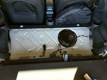 Remove seat back (latches) and bottom(pulls up from front).