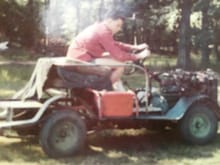 This was taken when I was 11 to 12 yrs old. wheel barrow tires, diamond plate fenders, overhead cam Crosley engine on Crosley frame. My first car!