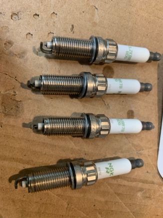 NGK Iridium spark plugs with under 200 miles of use. 