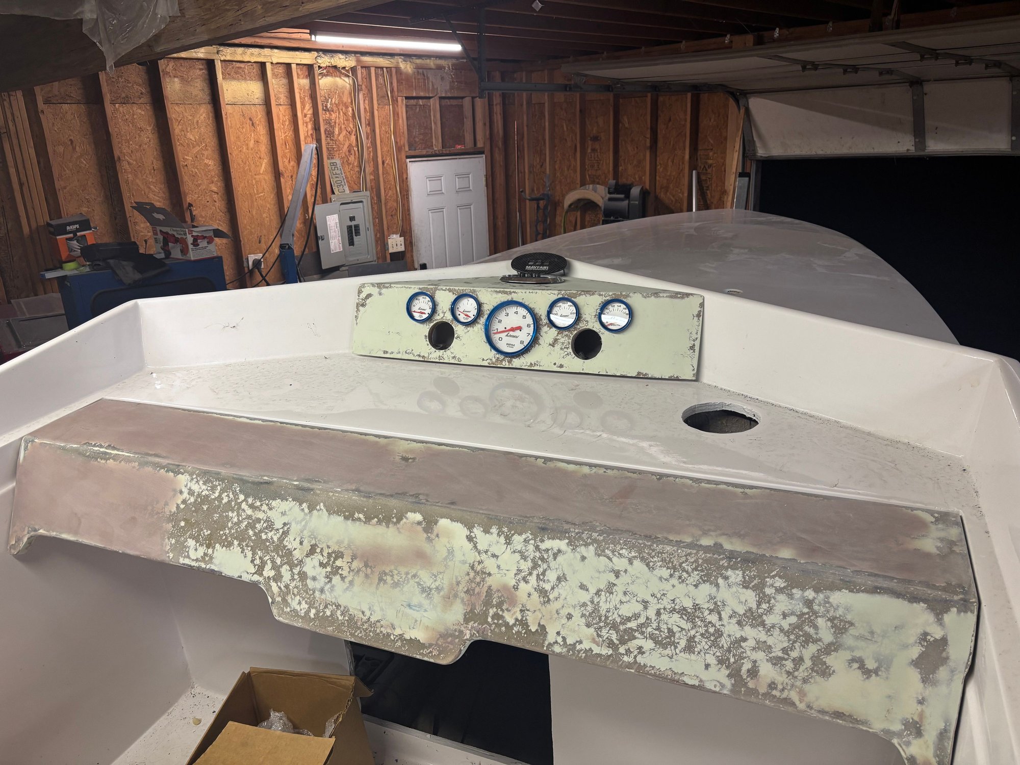 Dash and gauge pod just sitting in. All glassed and faired. Waiting for rain to stop to paint.