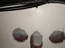 Inside engine compartment looking up, below opening under sun pad.