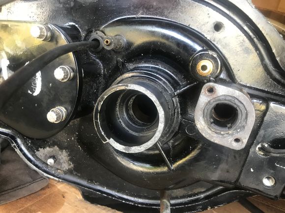 That bronze nipple right next to the water inlet is what I need to block off. You can push it right into the housing till it’s flush. 