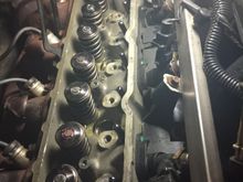 Bank 2 done!!! Remind me next time to just pull the damn heads.... You better believe the 6.0 im building for the yukon will have the springs swapped on the bench before they go on the engine!!!! Hell if i was smart this would have been a swap springs onto the ither heads and swap heads..... Probably would have been quicker and less taxing mentally!!!