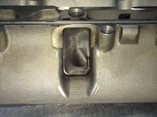 Intake port of lower manifold into the cylinder head port.