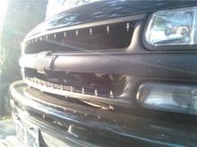 some spikes in the grill...cus every one and their moms have billets grills