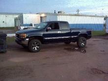 This is the AFTER picture of the 02 5.3 with a rough country levelling kit, New paint, bumpers, mirrors, wheels and tires. Amazing what kinda mileage can be put on these motors.