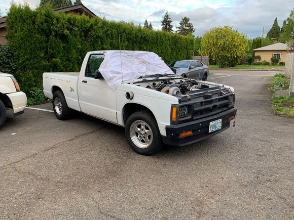 The towel was covering the windshield to protect the glass while using the grinder to trim out the inner fender