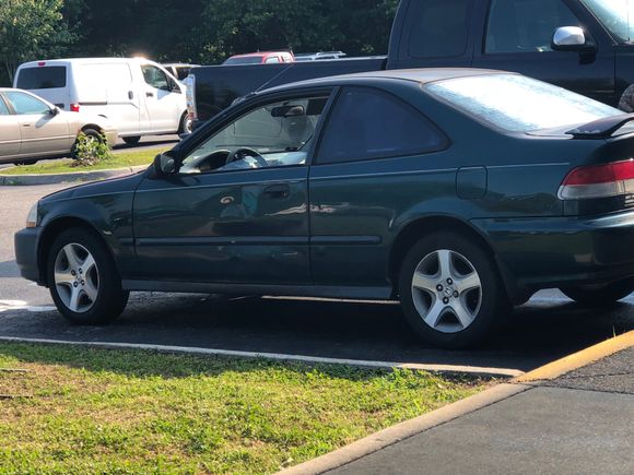 Whole new meaning to beater, dont think there is a straight panel on it and the hood is red