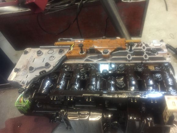 Valve body/tcm removed.... Screwed me up for a minute it had 10mm head bolts where the 10epc torx were supposed to be....
