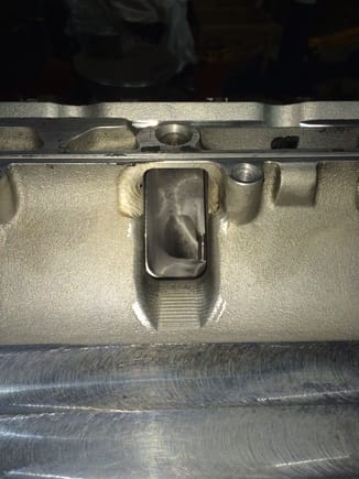 Intake port of lower manifold into the cylinder head port.