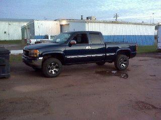 This is the AFTER picture of the 02 5.3 with a rough country levelling kit, New paint, bumpers, mirrors, wheels and tires. Amazing what kinda mileage can be put on these motors.
