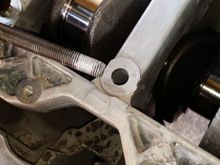 I use anti seize grease on the bolts and some on the block where the bolt will bolt down on.