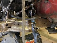 To help take weight off of the suspension assembly, I hooked-up some springs. The suspension now stays where I set it. Very handy for measuring.
I want to keep camber changes to + or - 1 degree, over 7" of travel, if possible.
The lower control arm, swings at one arc,
The upper arm swings at a shorter arc, 
and the tie-rod at somewhere in between.
The goal is to have all three arcs at their respective "0" point, at or near ride height, to minimize changes exerted on the spindle.  