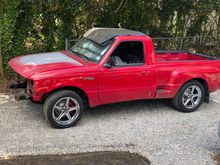 Engine and trans are currently "out", so she is riding a little high up front.