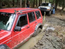 Buddy in his jeep got stuck. I ended up digging myself 4 nice holes and had to work on getting myself unstuck lol VERY soft ground down there. Ended up taking a 10,000 lb winch and a 2,500 winch together, both doubled up, to get it out.  We went back and stuck a stick in it, ended up being 6 inches of water and over a foot of solid mud in the bottom.
