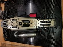 The chassis has scratches but is Flat. 
