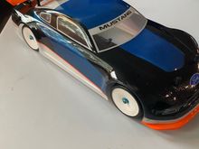 Mustang body in decent shape with some paint scuffed around wheels    