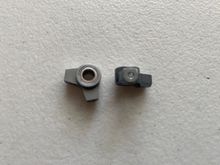 These are use set of aluminum locker arms, note broken ball stud in unit on right