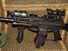A tippmann A5, heavily modified to a customers suggestions. Even the clamp mag on the side had fake 5.56 bullets. The marker was based upon a real M4 SIR layout.